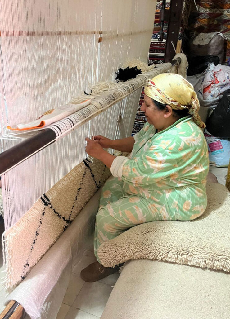 Moroccan Woman Weaving - photo by Marrakech Living